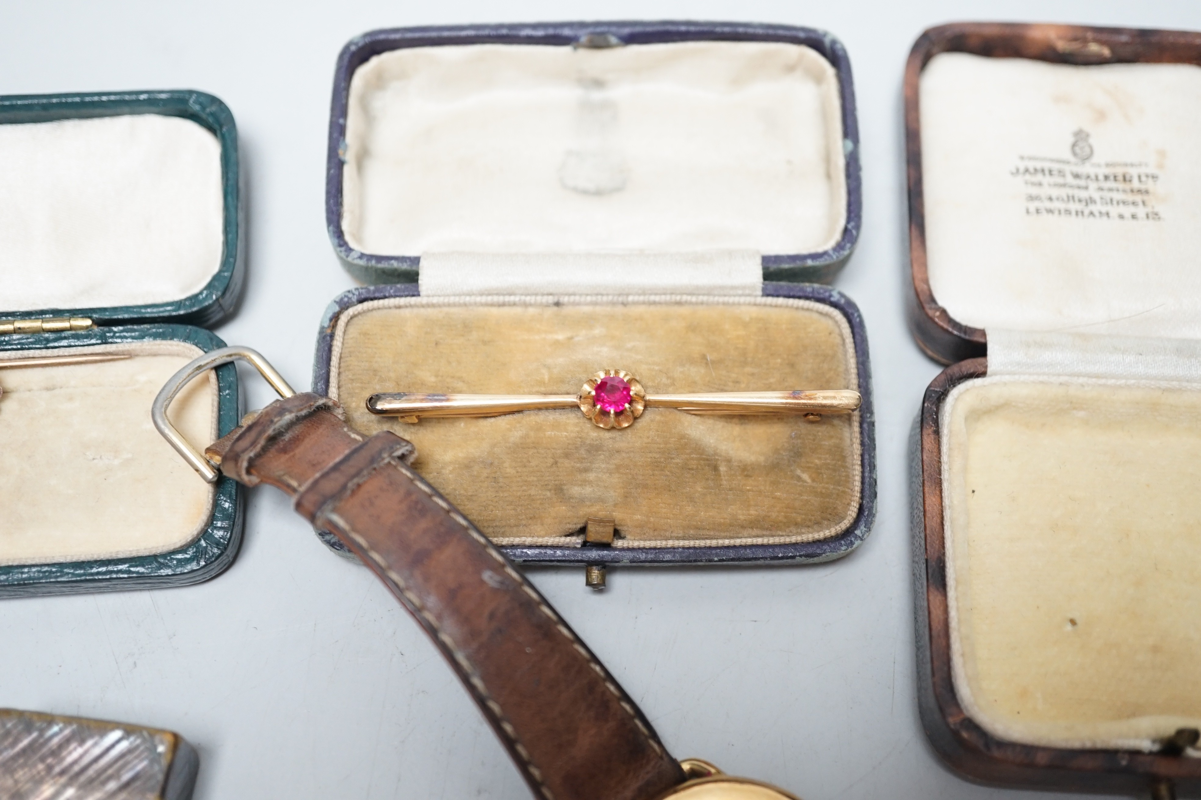 Mixed jewellery and other items including a 15ct fox head and horseshoe stick pin, a 9ct and diamond chip set stick pin, gem set yellow metal bar brooch, dress studs, lighters, lady's Rotary wrist watch, etc.